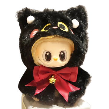 Plush toy with a black cat-like hood and red bow on a white background