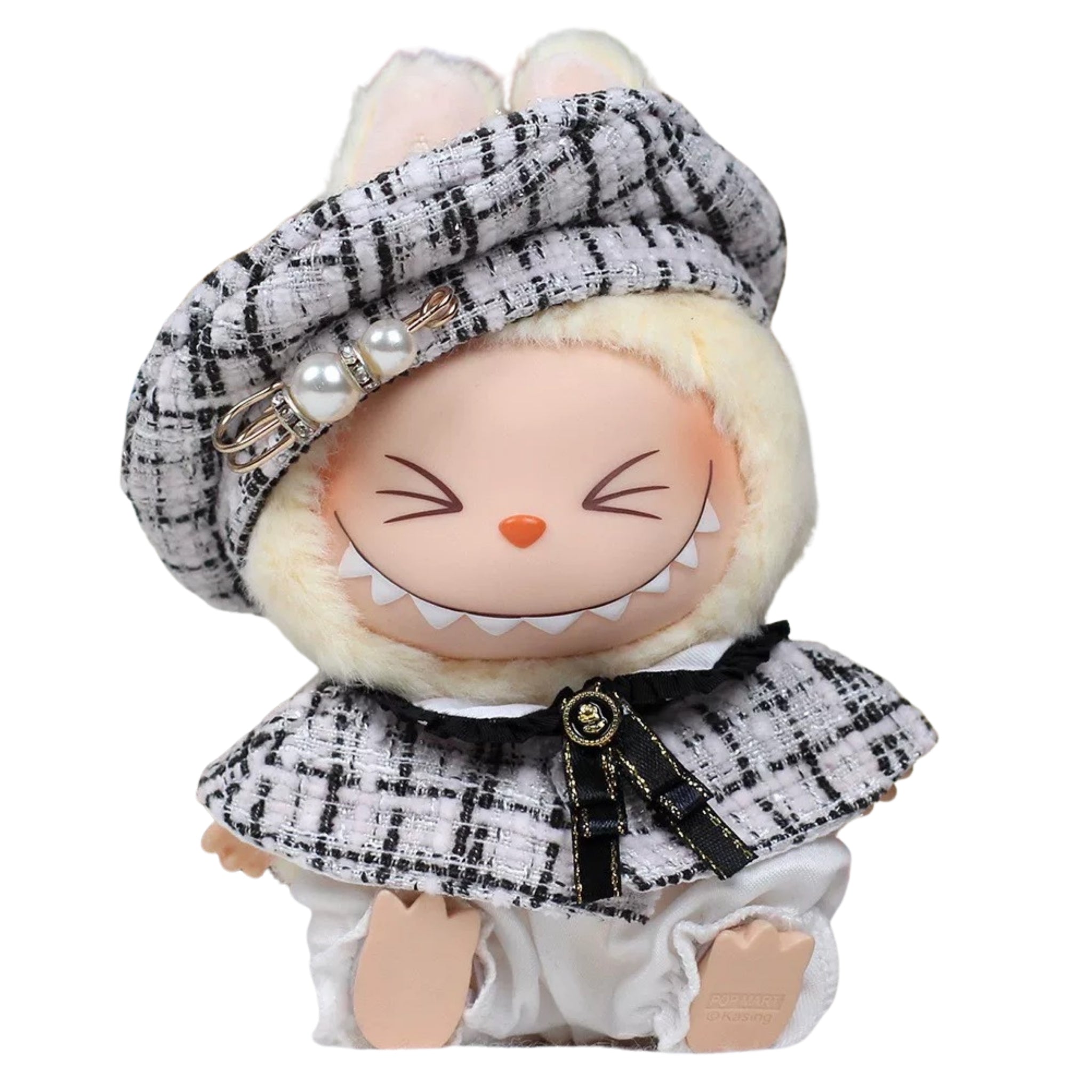 Toy figure with checkered outfit and hat on a white background