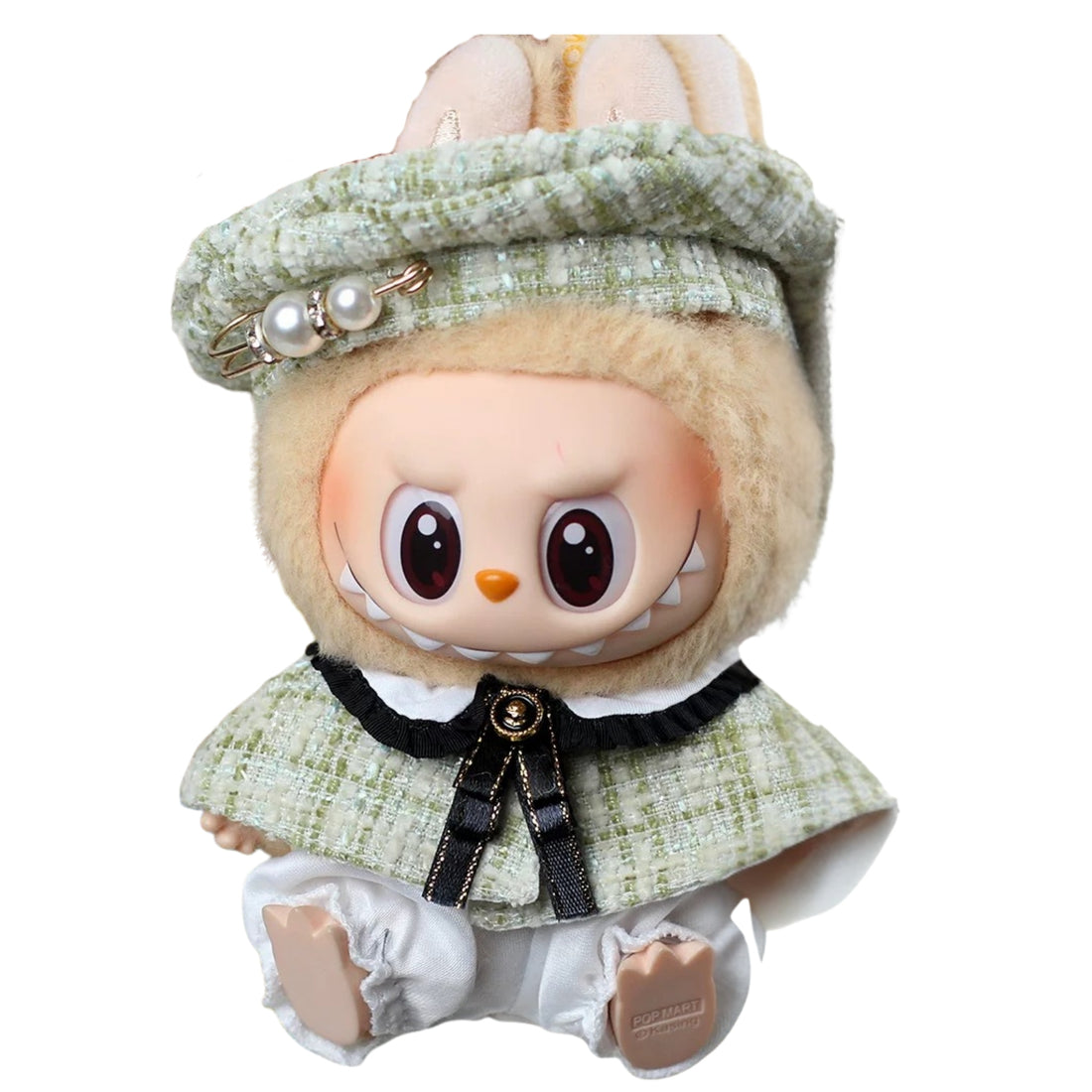 Toy figure with checkered outfit and hat on a white background