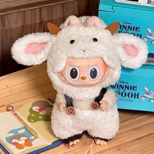 Plush toy resembling a character from Disney Winnie the Pooh on a wooden floor with a blue box in the background.