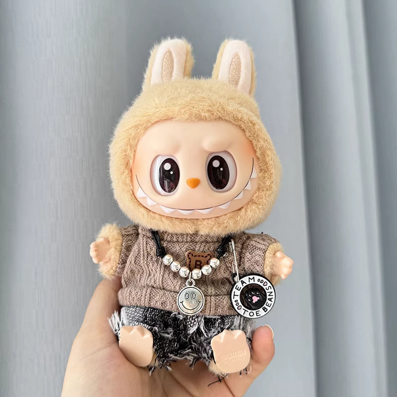 破洞牛仔褲和毛衣搭配